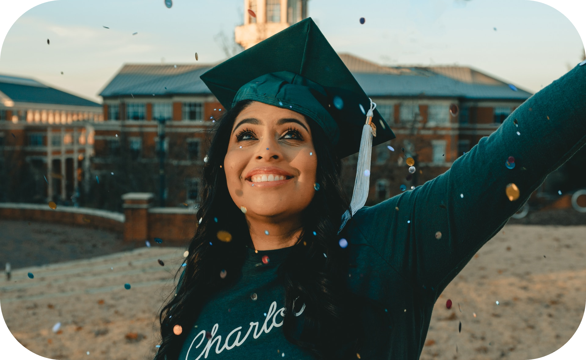 a girl wearing a bachelor's cap celebrating her graduation