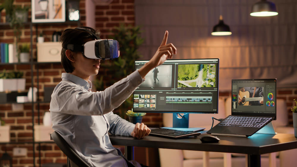 a videographer is wearing vr glasses in front of the computer